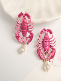 Handmade pink enamel lobster earrings with hanging white baroque pearls by TEARA.