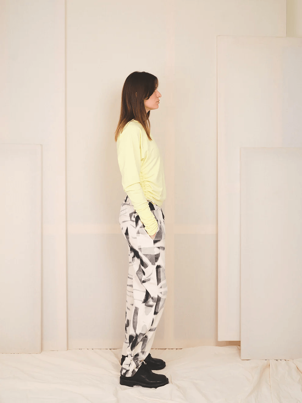 Model wearing the relaxed Pants 001 organic cotton trousers from independent designer RE-GARDE