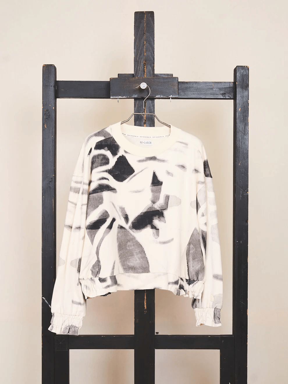 Detailed close up shot of the fine art painting print on super soft organic cotton